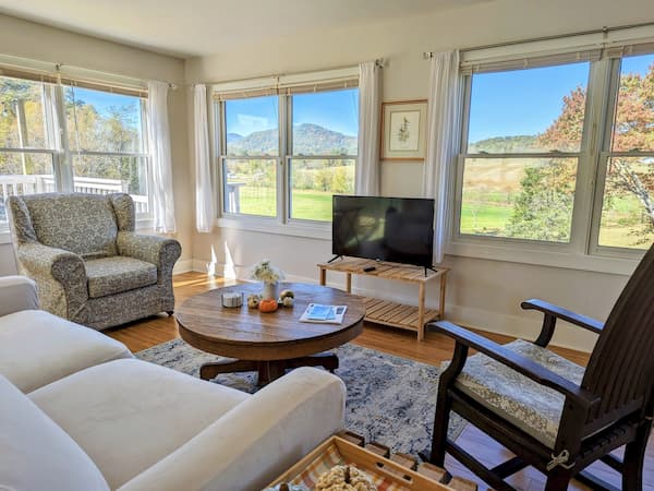 Living room with mountain views at the Asheville BnB