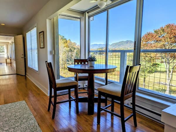 Sunroom with mountain views at the farm stay